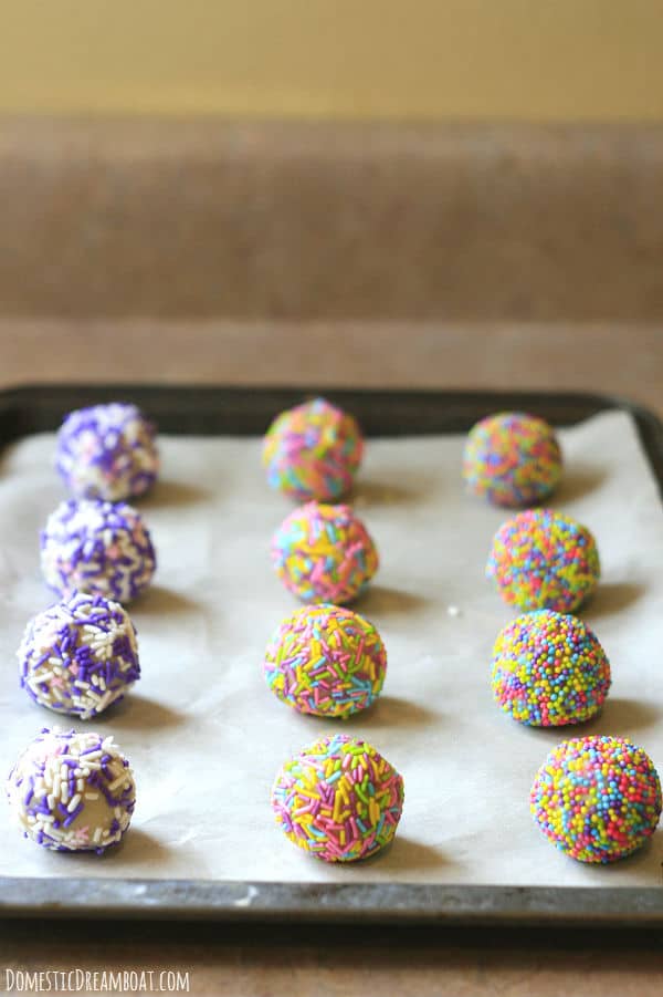 Balls of sugar cookie dough rolled in sprinkles.