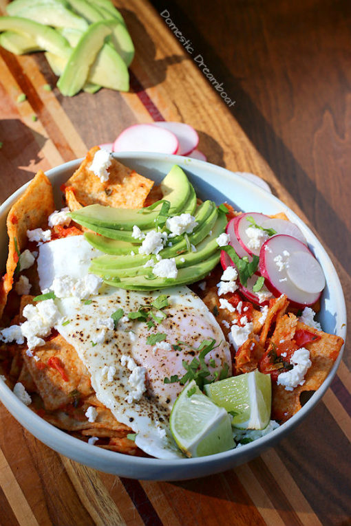 Quick and Easy chilaquiles in a pale blue bowl.