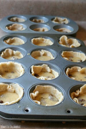 Butter tarts in muffin tin before baking