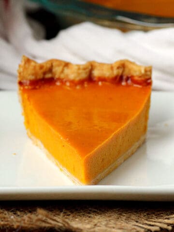 Slice of pumpkin pie on a plate