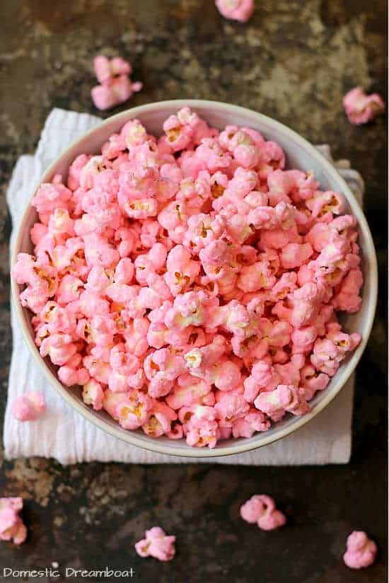 Overhead photo of pink popcorn in a bowl