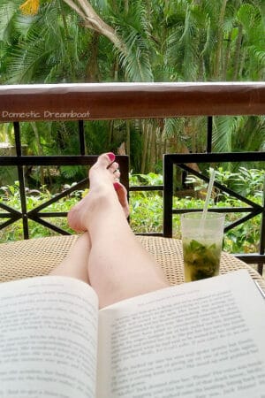Relaxing with a book and a mojito during naptime