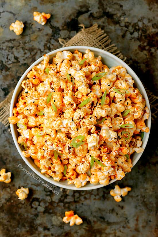 Overhead photo of gochujang butter popcorn in a bowl