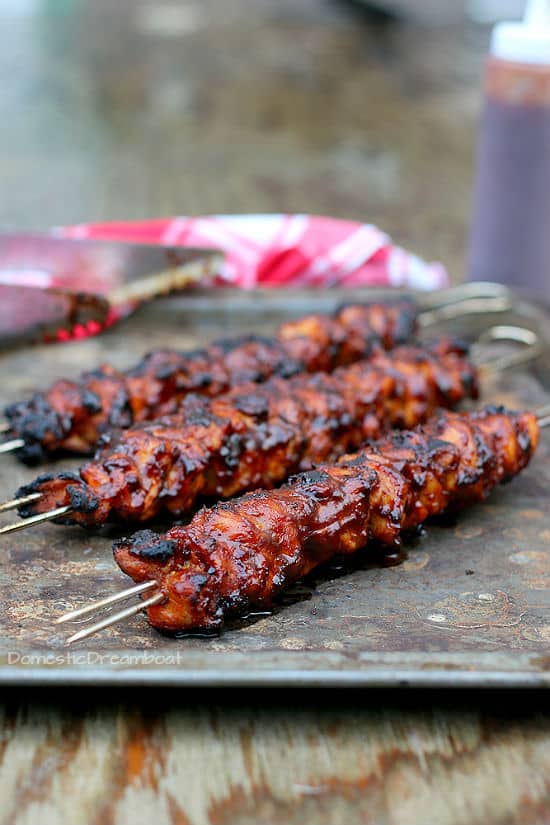 Closeup shot of grilled barbecue chicken skewers on a tray
