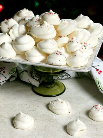 Vegan Meringue Cookies on a white platter.