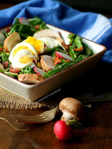 Warm Spinach Salad with Bacon, Eggs, and Mushrooms