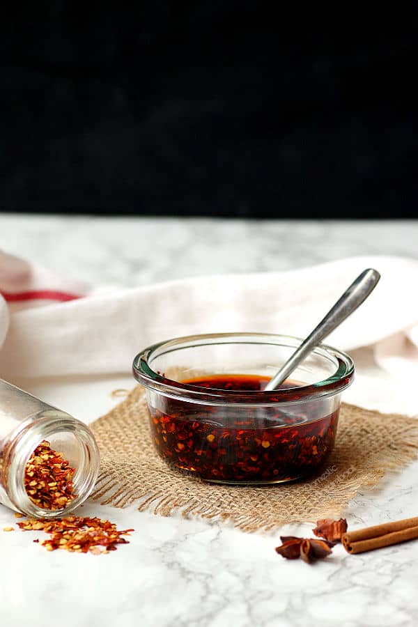 Homemade chile oil in a small glas bowl.