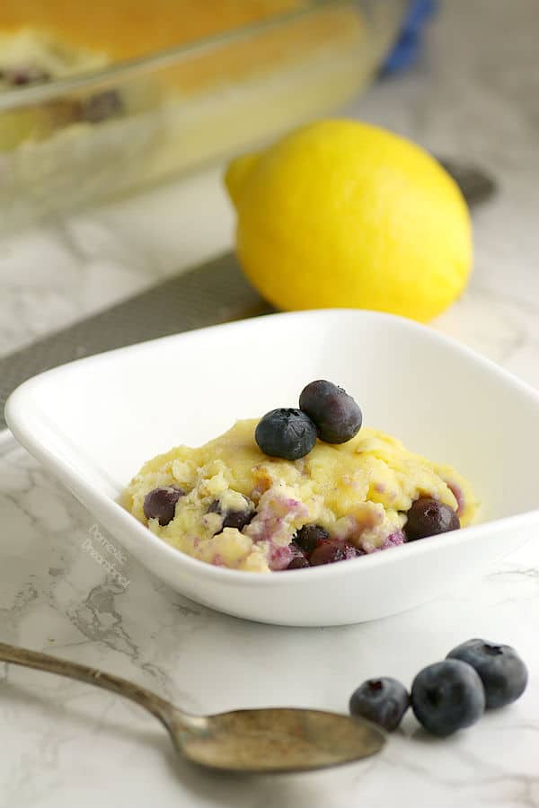 Blueberry Lemon Pudding Cake - Domestic Dreamboat #dessert #lemon #blueberry #puddingcake