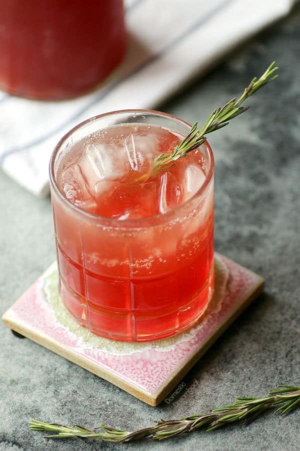 Strawberry shrub in a glass with ice.