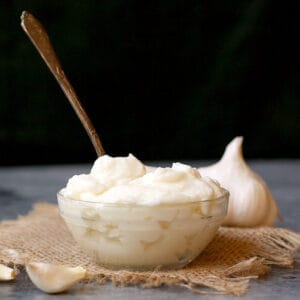 Lebanese Garlic Sauce in a bowl with a spoon