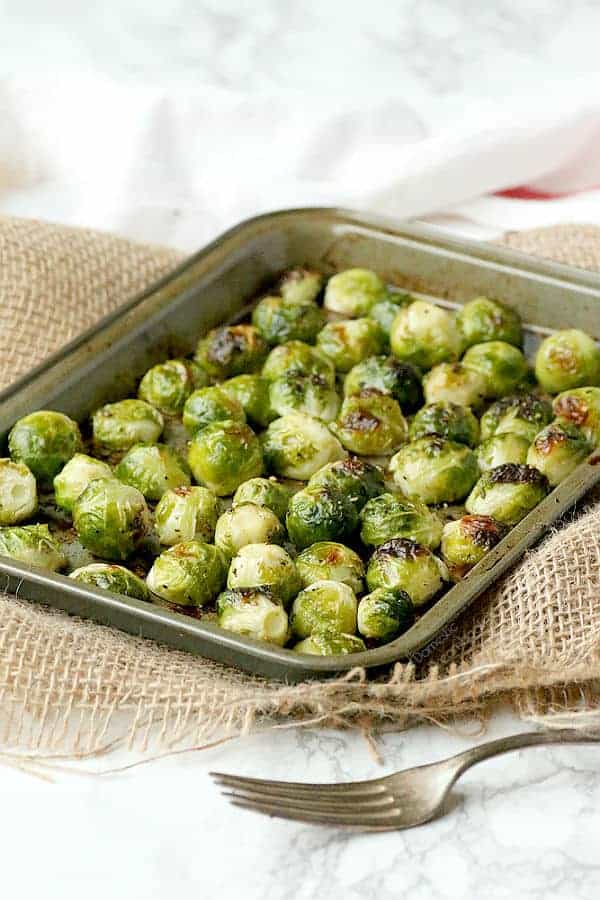 Perfect Roasted Brussels Sprouts on a small baking tray.