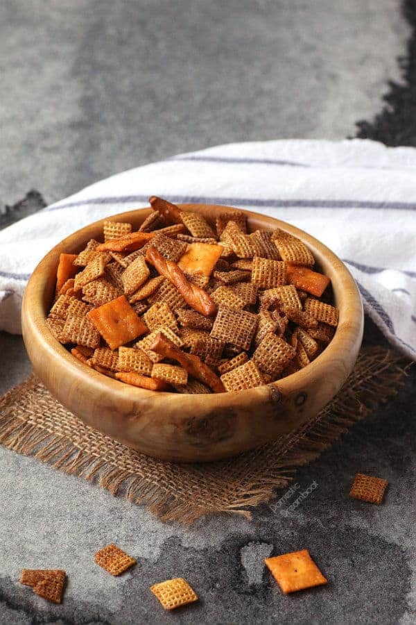Chex mix in a wooden bowl