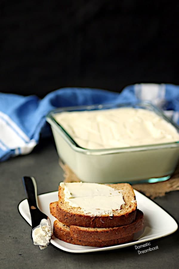 Homemade spreadable butter on whole grain bread