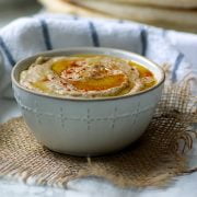 Homemade baba ghanouj in a white bowl.