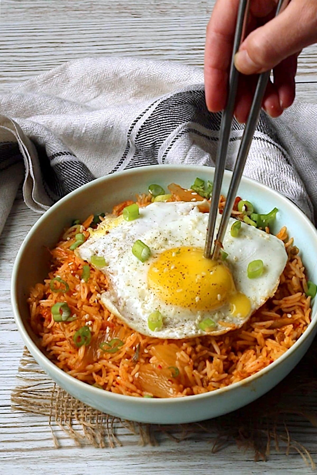 Homemade Kimchi Fried Rice with a sunny side egg on top.