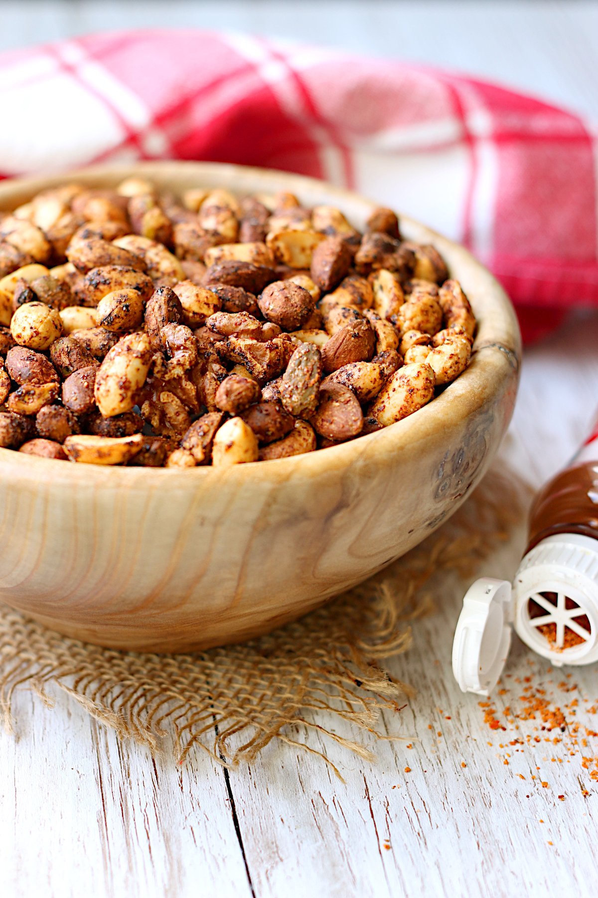 Roasted Chile Lime Nuts in a wood bowl.