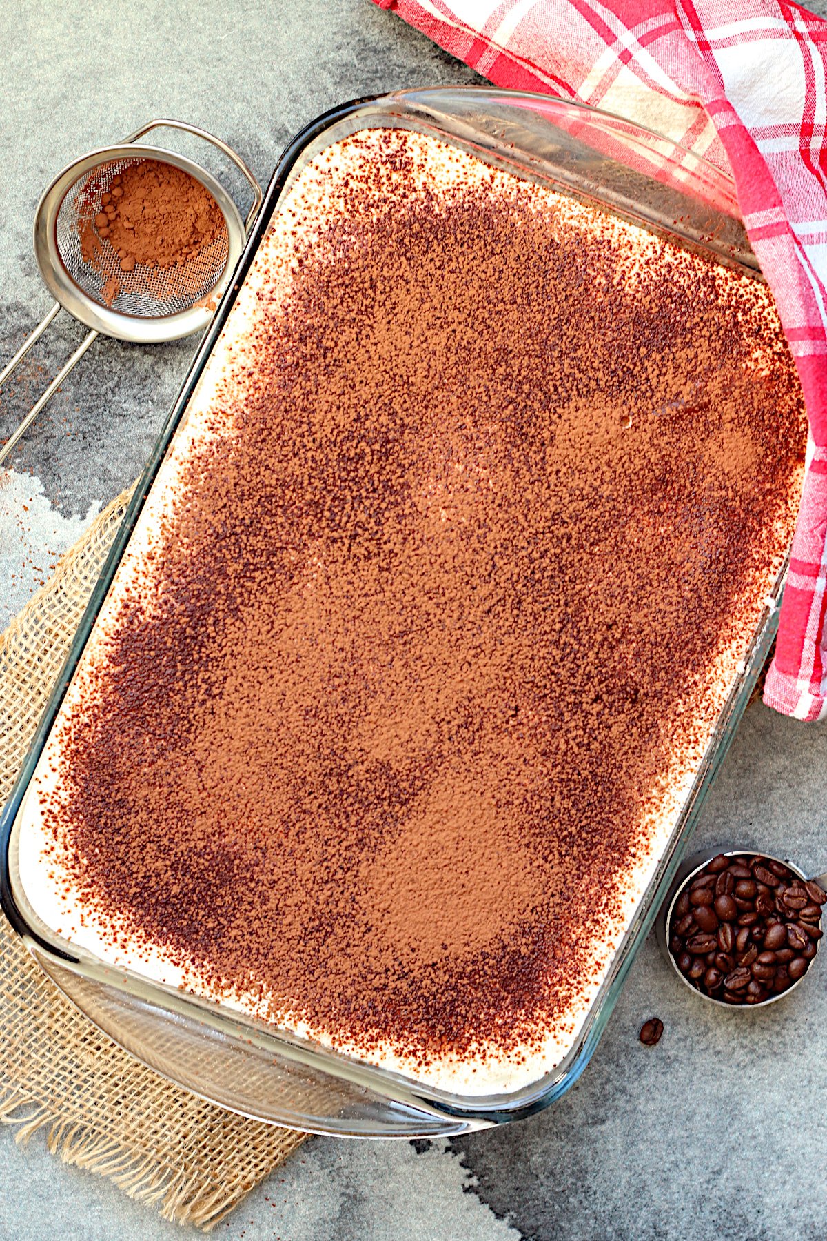 An overhead photo of Cottage Cheese Tiramisu in a glass baking dish.