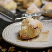 A close-up photo of an Air-Fried Chinese Sugar Egg Puff on a small white plate.
