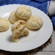 Cornstarch cookies (sequilhos) on a white plate.