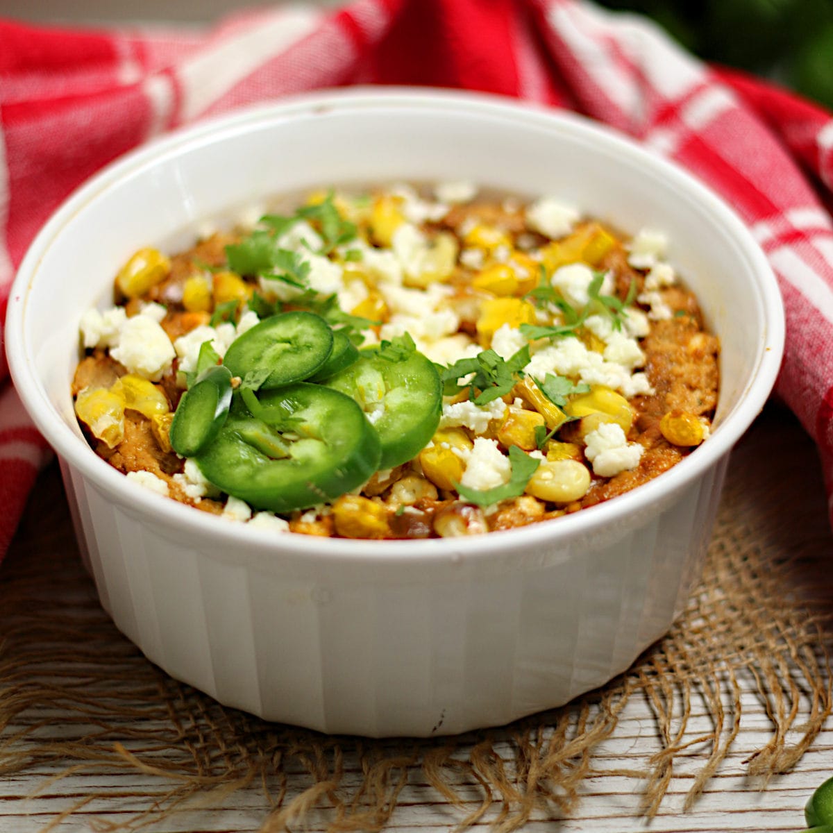 Mexican Street Corn Dip Mexican Street Corn Dip in a small casserole dish.