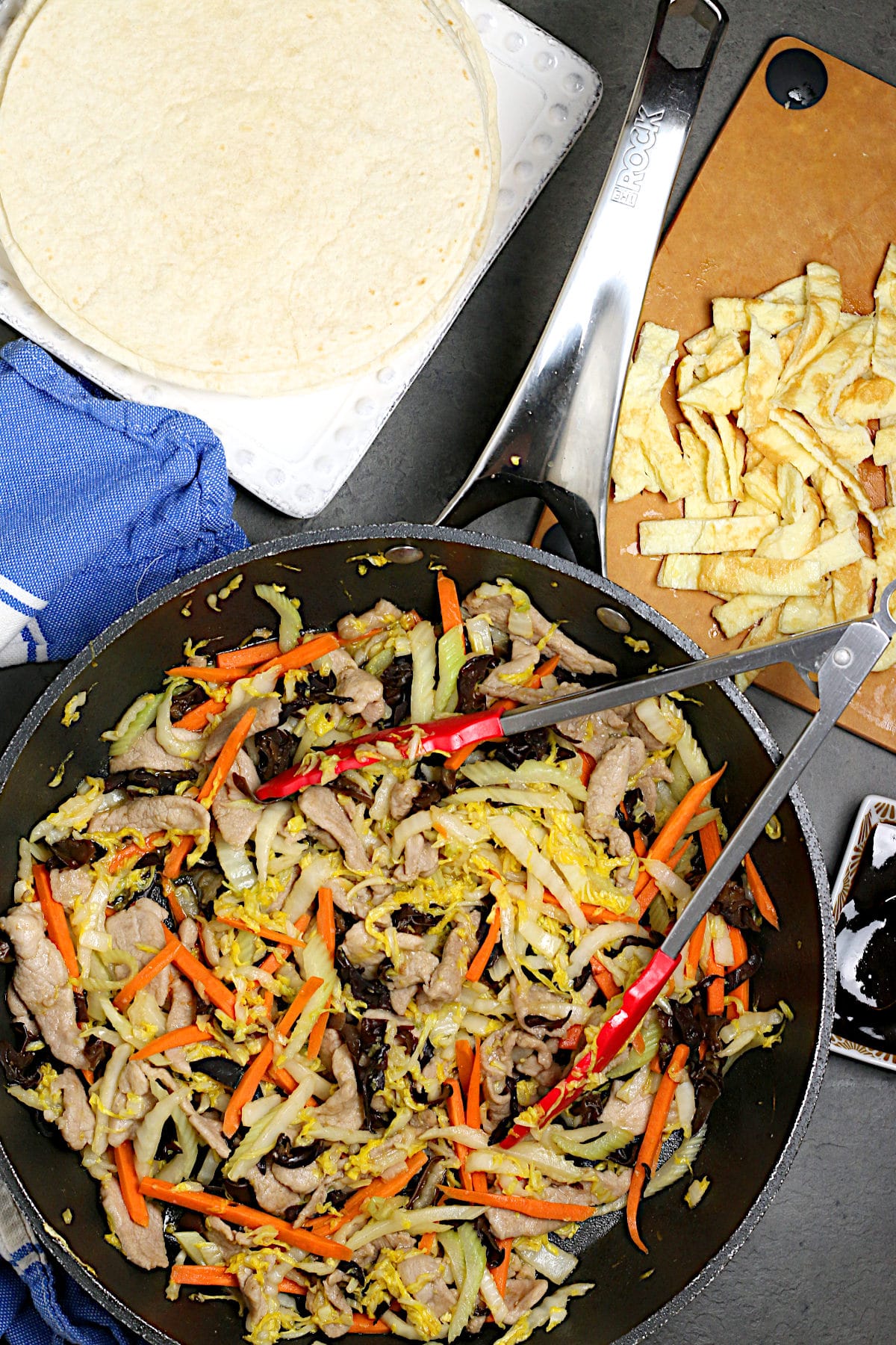 Easy Weeknight Moo Shu Pork An overhead photo of Easy Weeknight Moo Shu Pork in a skillet.