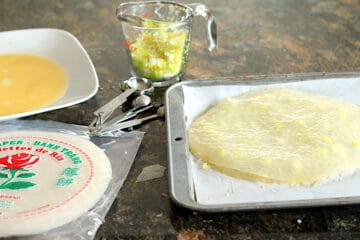 The assembly of a Rice Paper Green Onion Cake.