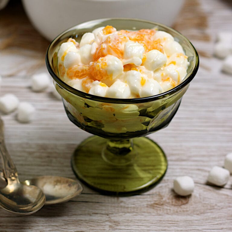 Orange Dream Ambrosia in a green dessert cup.