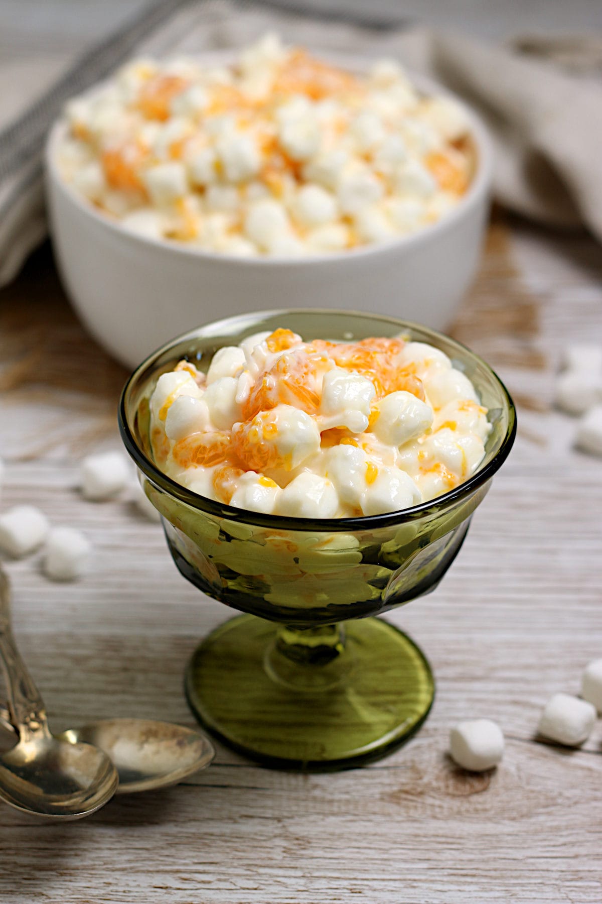 Orange Dream Ambrosia in a green dessert cup.
