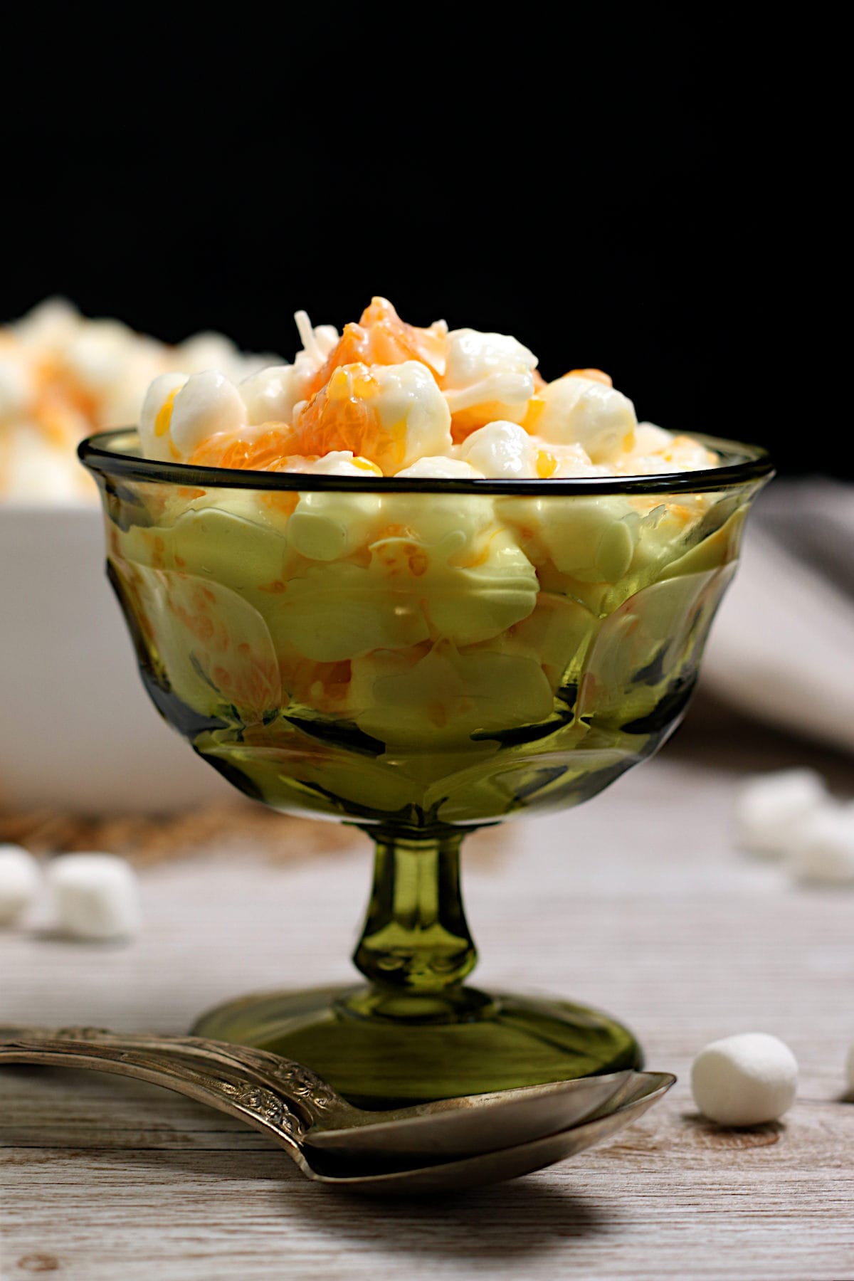 Orange Dream Ambrosia in a green dessert cup.
