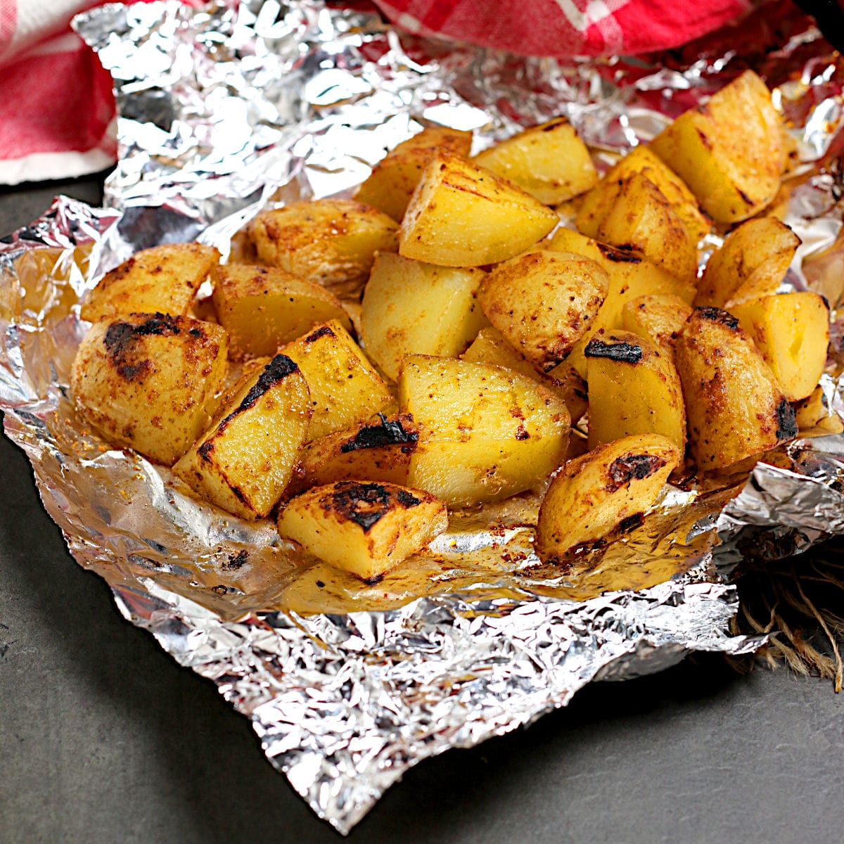 Grilled Foil Pack Potatoes on a piece of foil.