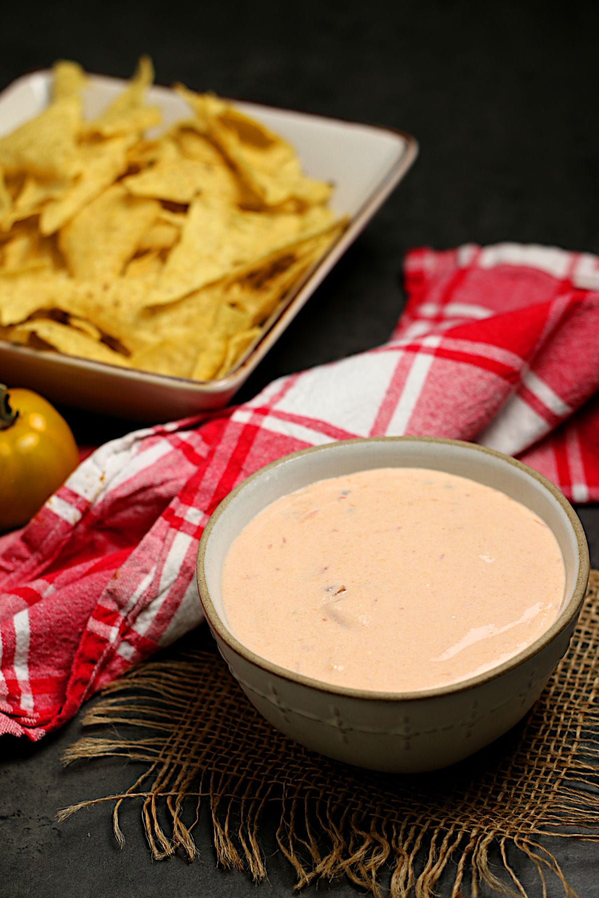 Cottage Cheese Queso in a small white bowl.