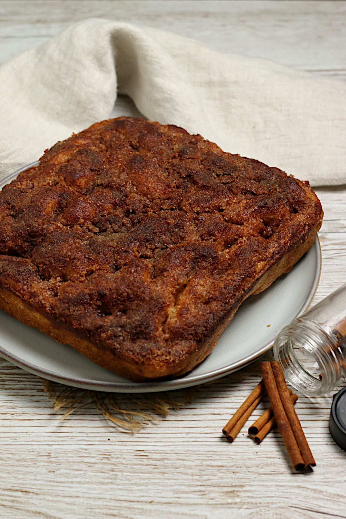 Cinnamon Toast Focaccia A whole loaf of Cinnamon Toast Focaccia on a large plate.