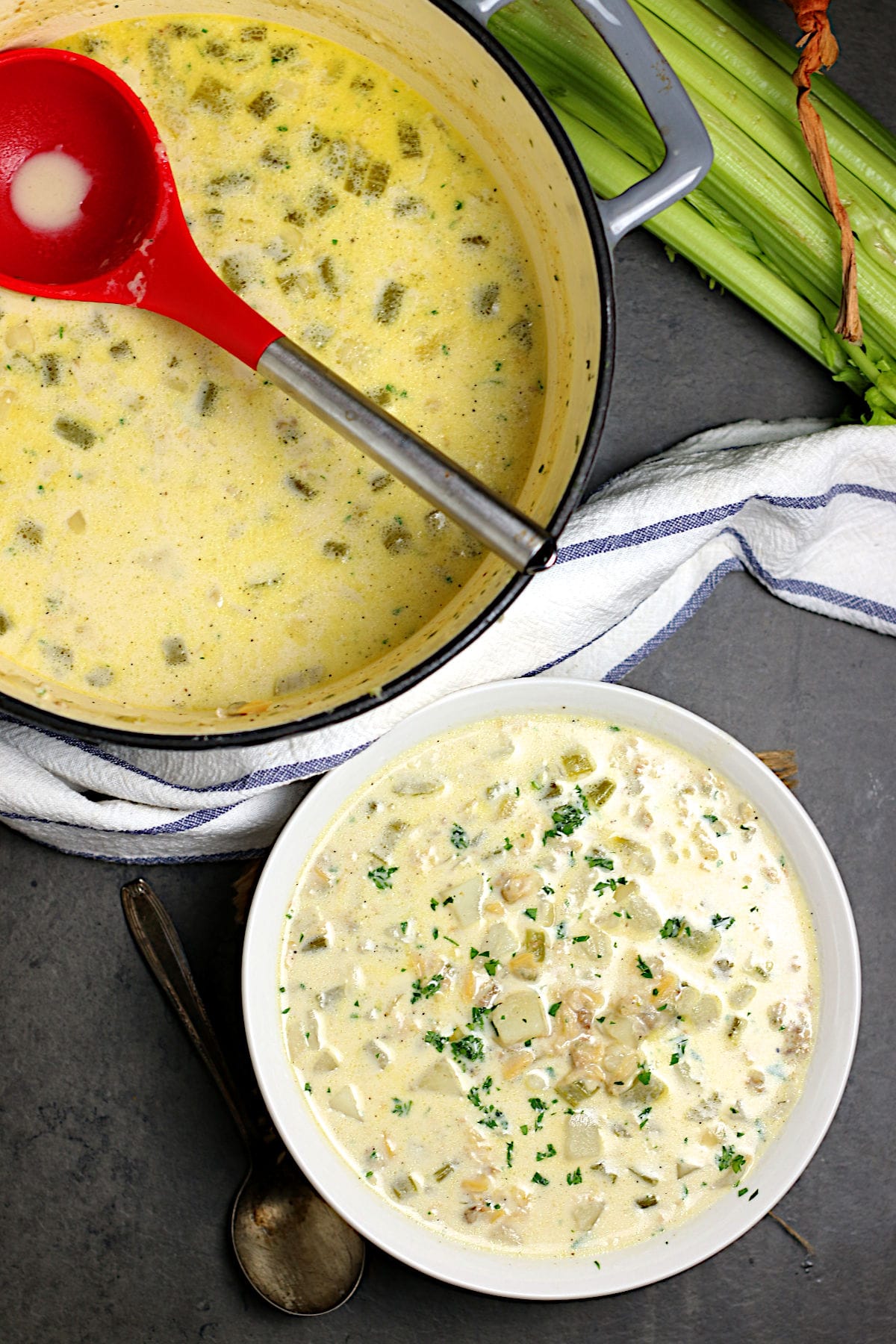 An overhead photo of Easy New England Clam Chowder in a white bowl.