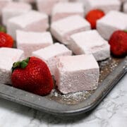 Homemade Strawberry Marshmallows on a baking sheet.