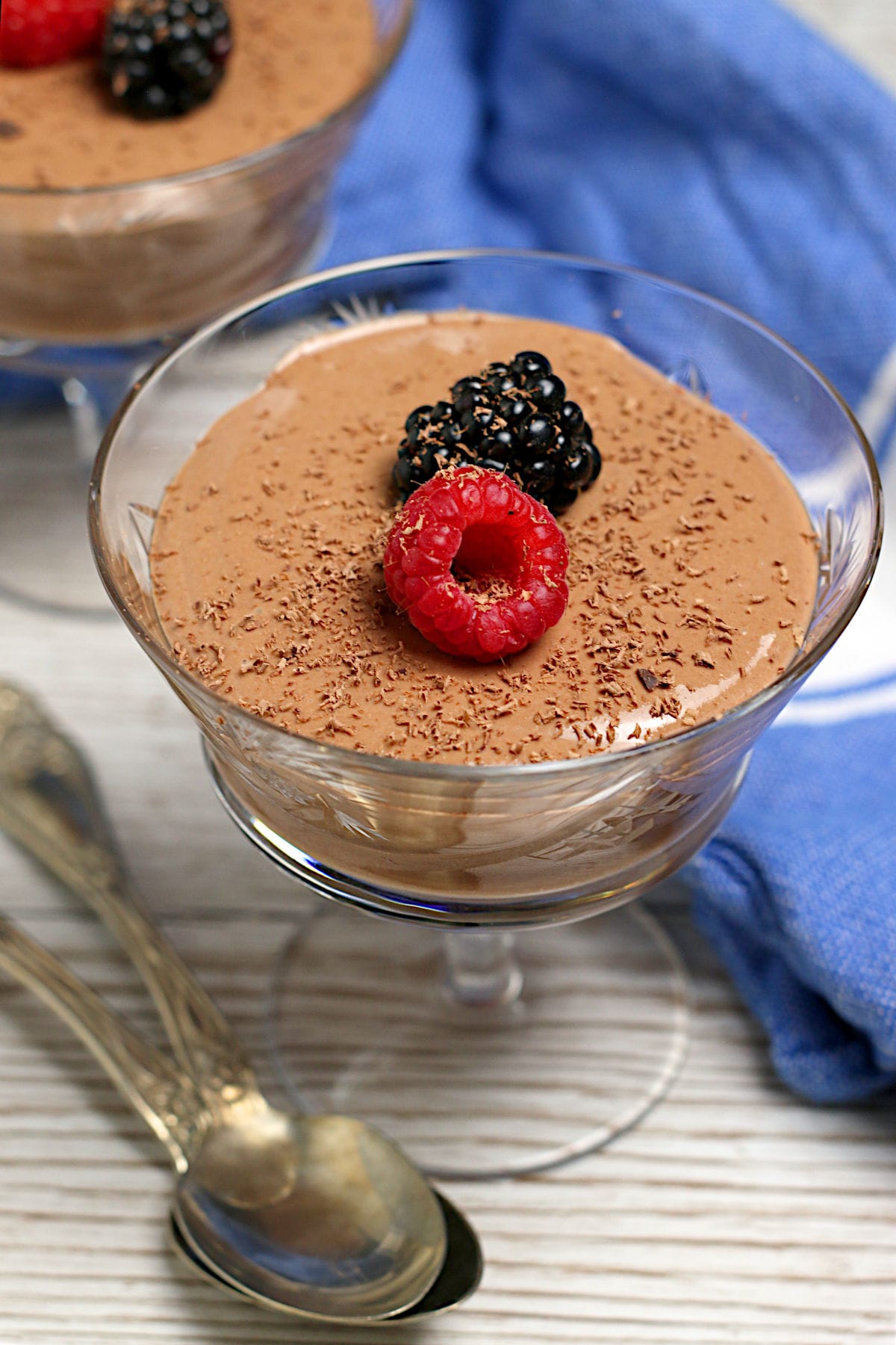 Cottage Cheese Chocolate Mousse A crystal goblet containing Cottage Cheese Chocolate Mousse garnished with berries and shaved chocolate.