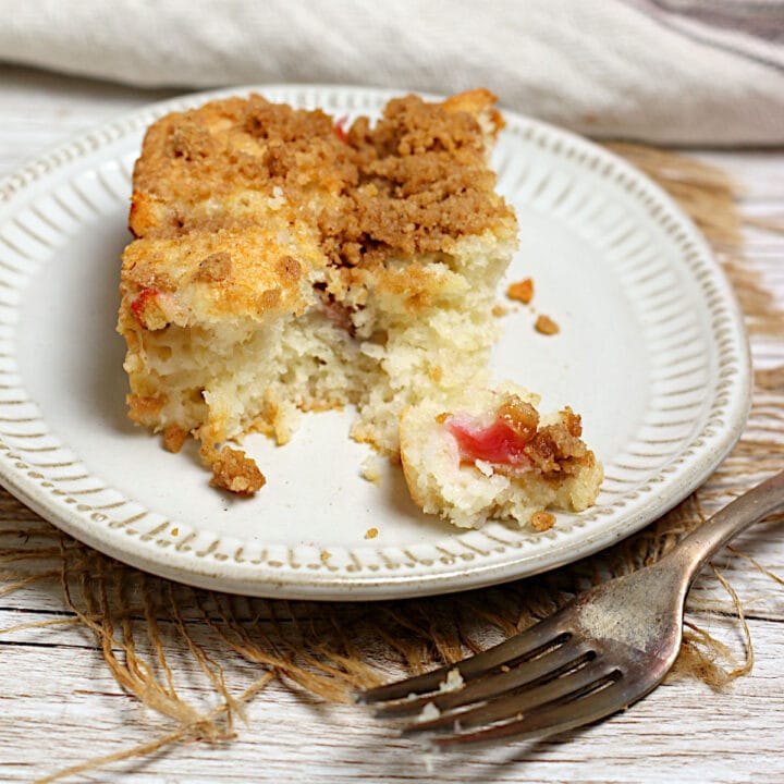 Greek Yogurt Rhubarb Coffee Cake on a small white plate.