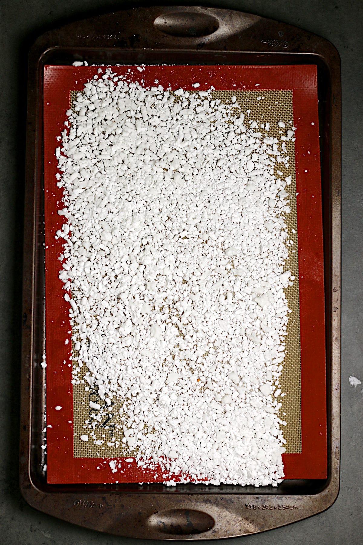 DIY Pearl Sugar DIY Pearl Sugar on a silicone mat-lined baking sheet.