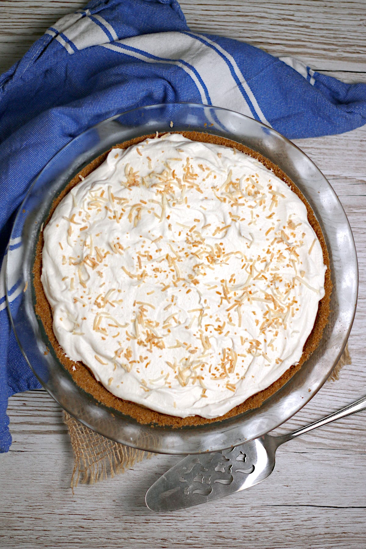 Coconut Cream Pie An overhead photo of a Coconut Cream Pie in a glass pie pan.