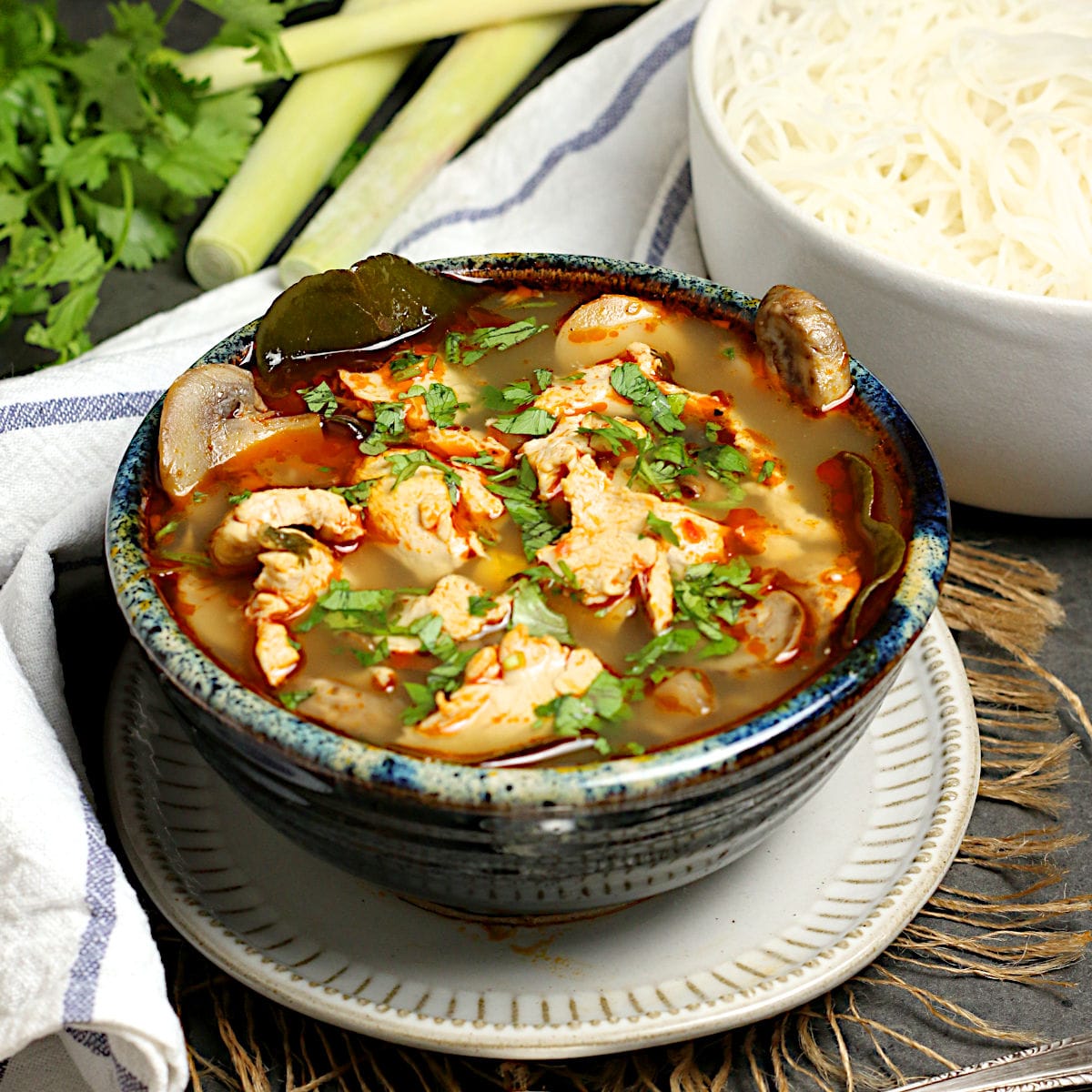A bowl of homemade Tom Yum Gai (Thai Hot and Sour Chicken Soup with Chicken).