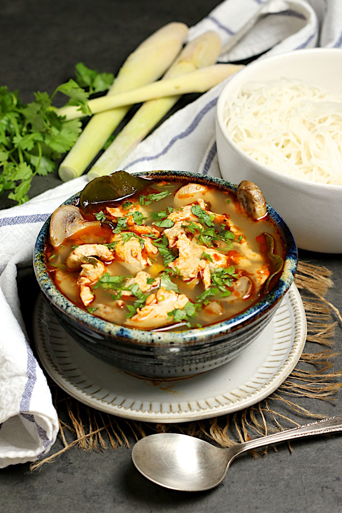 A bowl of homemade Tom Yum Gai (Thai Hot and Sour Chicken Soup with Chicken).