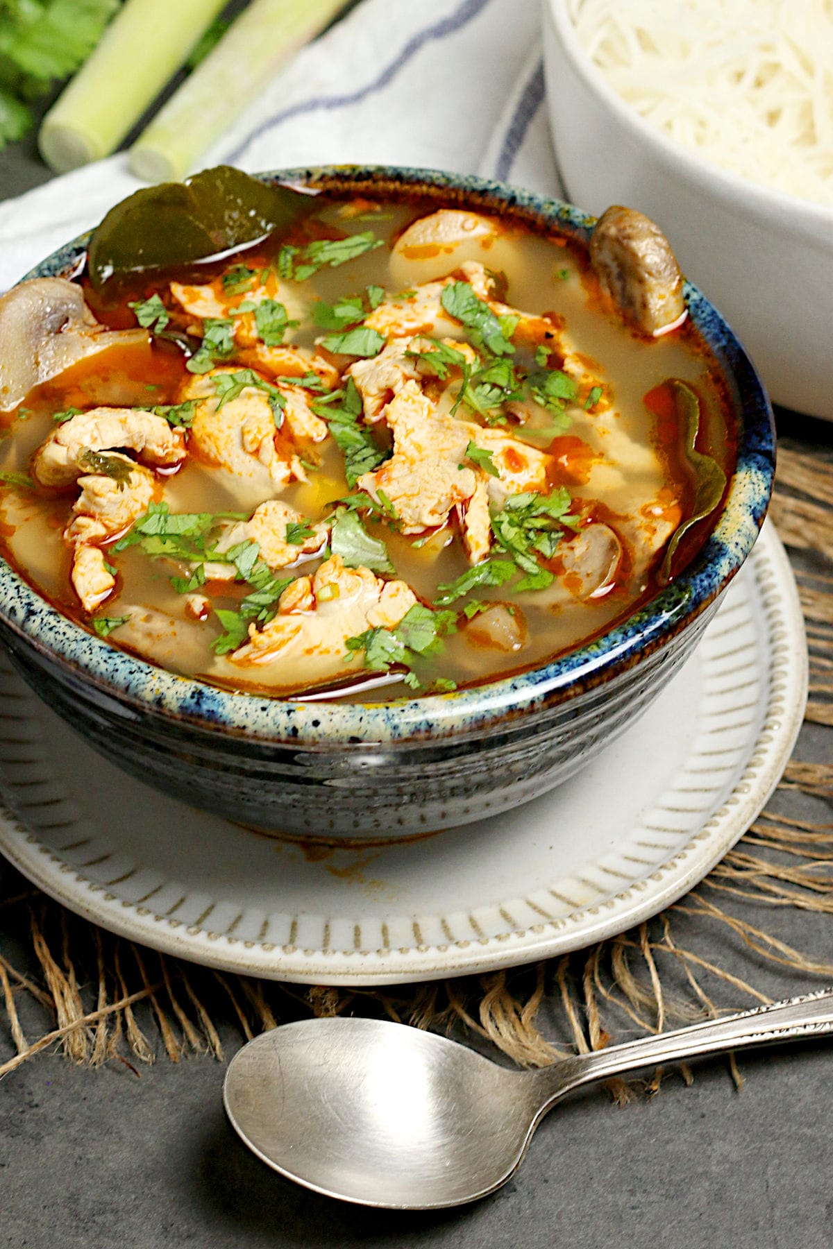 A bowl of homemade Tom Yum Gai (Thai Hot and Sour Chicken Soup with Chicken).