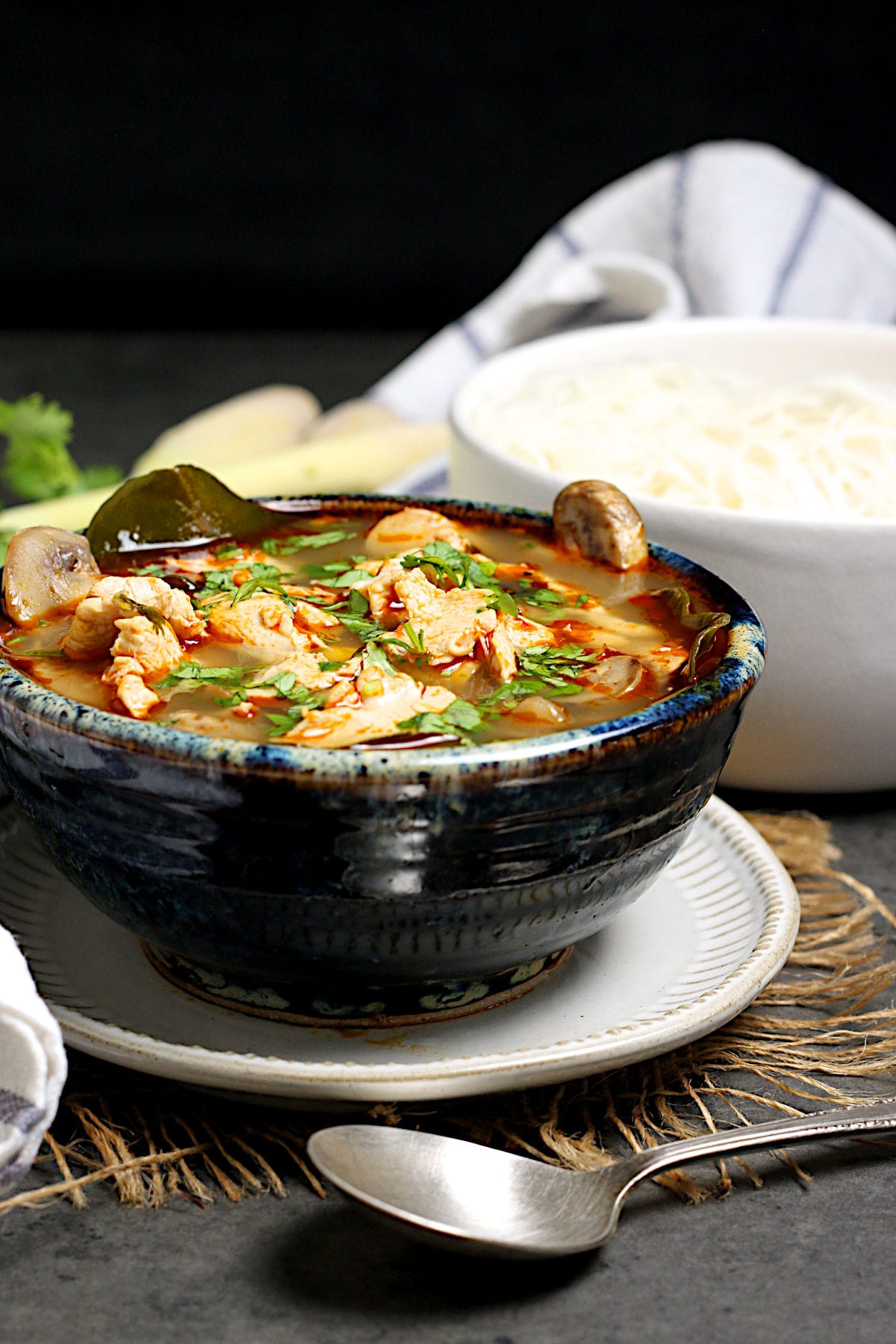 A bowl of homemade Tom Yum Gai (Thai Hot and Sour Chicken Soup with Chicken).